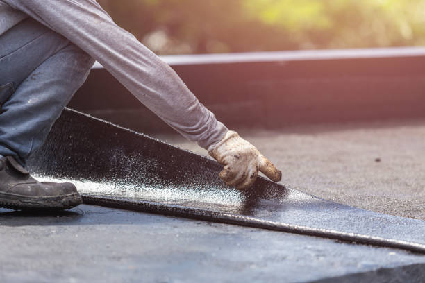 Professional Waterproofing technician working in Greensboro, IN